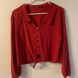 Zara red button up top.